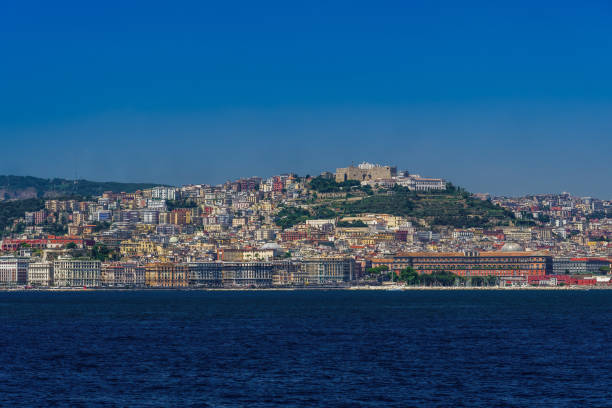 Naples, Italy city center coastal sea view under cloudless blue sky. stock photo