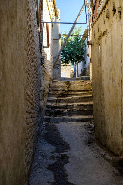 Narrow ancient pedestrian street with stairways in old town. stock photo