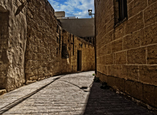 A narrow street in Gharghur, Malta stock photo