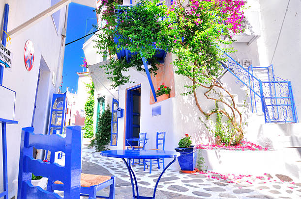 Narrow whitewashed street of Skiathos, Greece stock photo