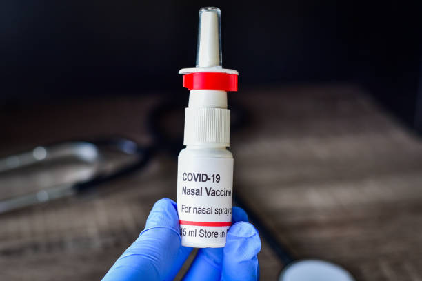 Nasal spray inhalation COVID-19 vaccine stock photo