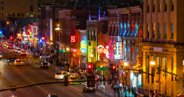 Nashville Broadway Strip Nashville, Tennessee - October 8, 2017: Neon signs light the strip along Broadway in Nashville broadway nashville stock pictures, royalty-free photos & images
