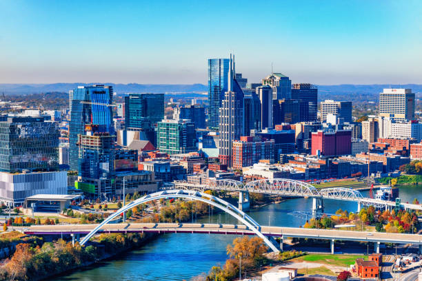 Nashville, Tennesee Skyline Aerial view of the skyline of beautiful Nashville, Tennessee, known as "Music City" along the banks of the Cumberland River. cumberland river stock pictures, royalty-free photos & images