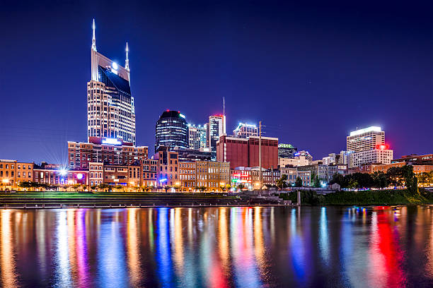 Nashville Tennessee Nashville, Tennessee, USA downtown skyline on the Cumberland River. nashville stock pictures, royalty-free photos & images