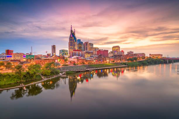 Nashville, Tennessee, USA downtown cityscape Nashville, Tennessee, USA downtown cityscape at dusk. cumberland river stock pictures, royalty-free photos & images