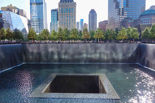 National 9 11 Memorial in NY New York, USA - September 23, 2014: National September 11 Memorial is an educational and historical institution honoring the victims of the Twin Towers attack 911 memorial stock pictures, royalty-free photos & images