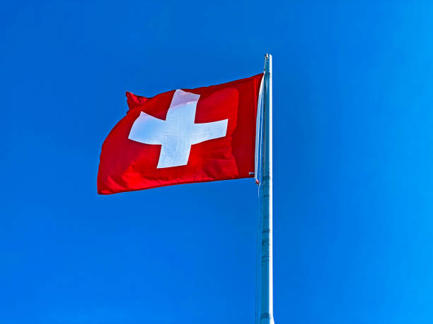 National flag of the Swiss Confederation (Flag of Switzerland - National Flag of Switzerland)- Nationalflagge der Schweizerischen Eidgenossenschaft (Offizielle Flagge der Schweiz - Schweizer Flagge) stock photo