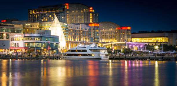 National Harbor - Maryland at Night Long Exposure of the National Harbor in Maryland at Night Time national landmark stock pictures, royalty-free photos & images