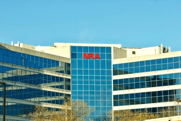 National Rifle Association (NRA) Headquarters Fairfax, Virginia / USA - December 18, 2019: Sun reflects off the National Rifle Association (NRA) headquarters building in suburban Northern Virginia near Washington, D.C. nra stock pictures, royalty-free photos & images