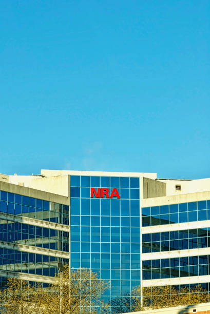 National Rifle Association (NRA) Headquarters Fairfax, Virginia / USA - December 18, 2019: Sun reflects off the National Rifle Association (NRA) headquarters building in suburban Northern Virginia near Washington, D.C. nra stock pictures, royalty-free photos & images
