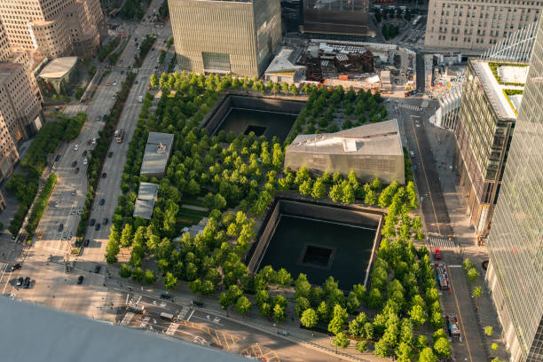 National September 11 Memorial plaza New York City, USA - May 28, 2019: The National 9/11 Memorial plaza viewed from above in a summer afternoon 911 memorial stock pictures, royalty-free photos & images