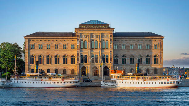 nationalmuseum, or national museum of fine arts, peninsula blasieholmen in central stockholm, sweden, at sunset - summer stockholm bildbanksfoton och bilder