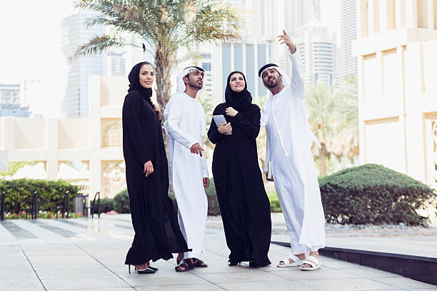 UAE Nations in traditional dress, Dubai, United Arab Emirates stock photo
