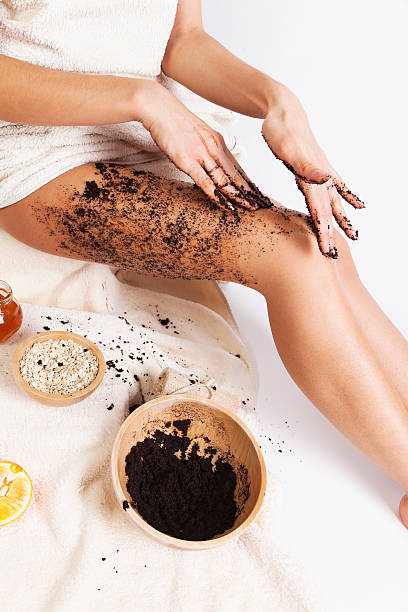 Natural Body Care. Cellulite Massage with Coffee scrub, oats, honey. stock photo