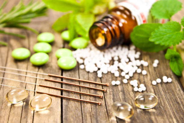Natural healing alternative medicine Natural healing alternative medicine close up acupuncture stock pictures, royalty-free photos & images