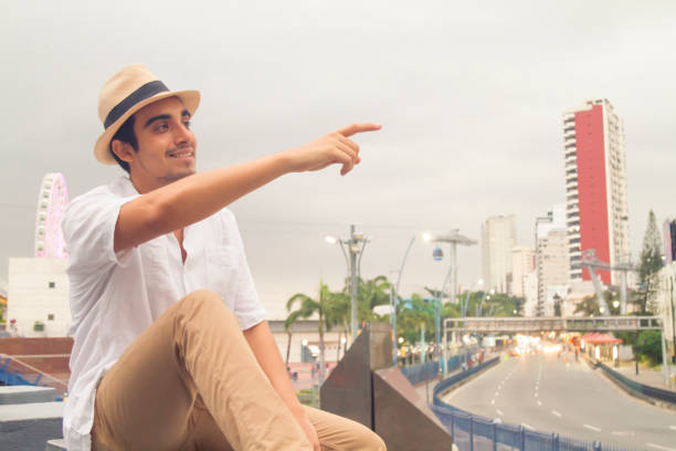 Natural male Portrait of casual smiling fit young man at Guayaquil, Ecuador stock photo
