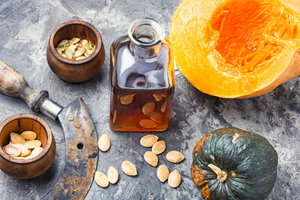 Natural pumpkin seed oil stock photo
