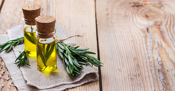 Natural rosemary essential oil for beauty and spa stock photo
