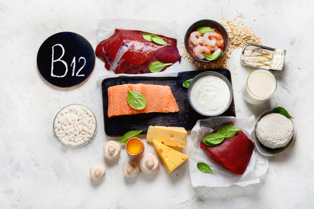 Natural sources of Vitamin B12 Natural sources of Vitamin B12 (Cobalamin) for normalization of sleep;  ensuring normal brain function; supporting the respiratory system;  alzheimer's deasease treatment. Top view liver offal photos stock pictures, royalty-free photos & images
