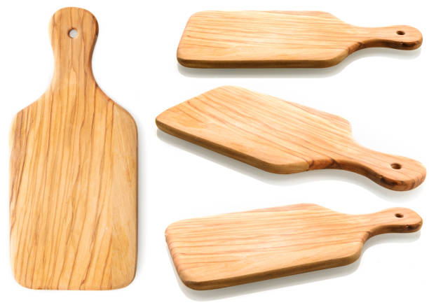 Natural wooden cutting board stock photo