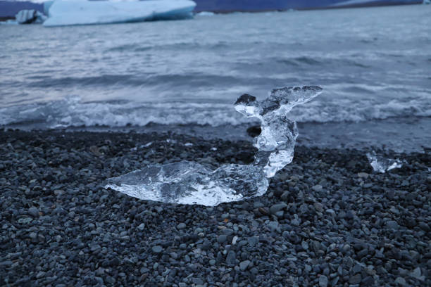 Naturally formed ice sculpture on the beach near the Jokulsarlon glacier lagoon stock photo