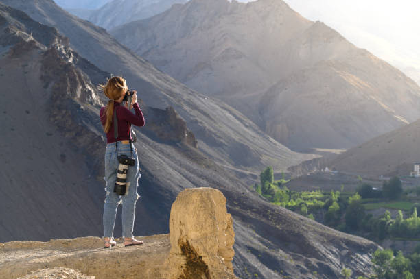 Nature photographer, traveller concept. Young asian woman taking photos of landscape view in Ladakh, North india Nature photographer, traveller concept. Young asian woman taking photos of landscape view in Ladakh, North india lamayuru stock pictures, royalty-free photos & images