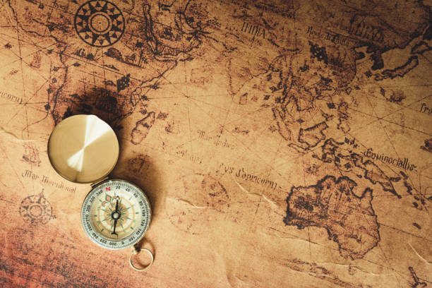 Navigator explore journey with compass and world map., Travel destination and planning vacation trip., Vintage concept. stock photo