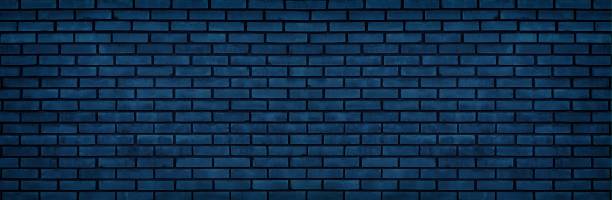 texture large de mur bleu marine de brique. fond grand écran de maçonnerie de bloc foncé. toile de fond d’indigo de nuit sombre - fond bleu marine photos et images de collection