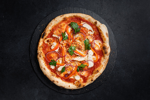 Neapolitan pizza on black background
