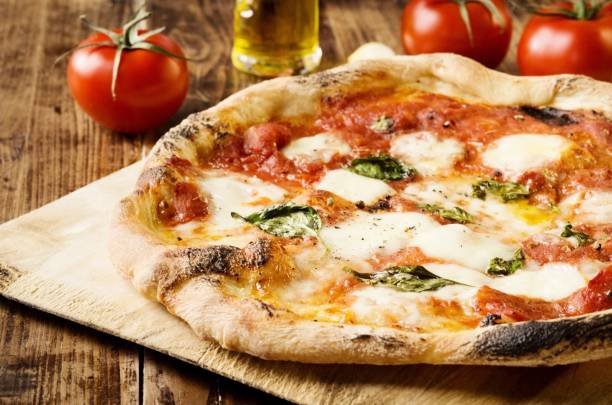 Neapolitan Pizza Neapolitan Pizza with buffalo mozzarella and basil homemade stock pictures, royalty-free photos & images