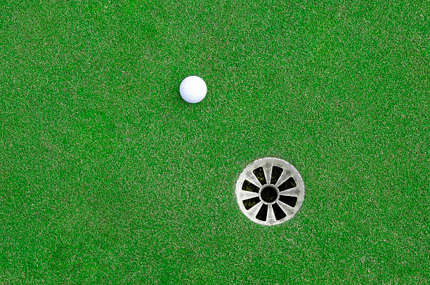 Near the Hole A gimme putt.Here are some more golf/grass images: hole stock pictures, royalty-free photos & images