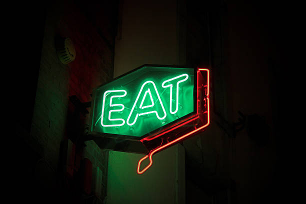 neon fast food restaurant sign stock photo