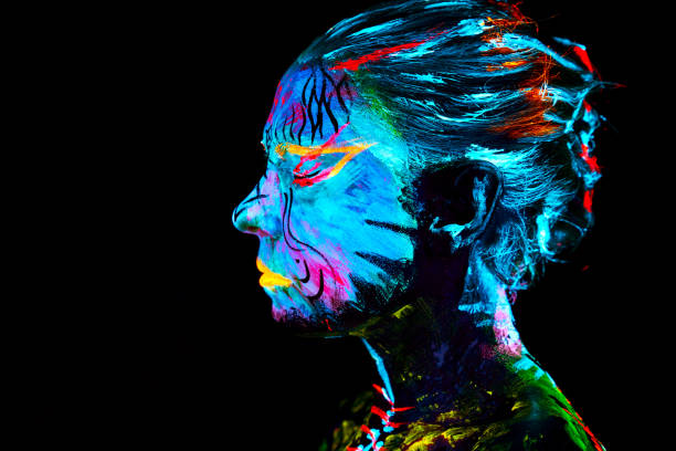 neon paint creative glowing UV portrait stock photo