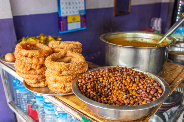 Nepalese food breakfast with Sel Roti and chickpeas. Kathmandu, Nepal. stock photo