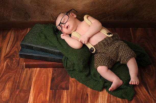 Ten day old newborn baby boy wearing crocheted shorts and suspenders....