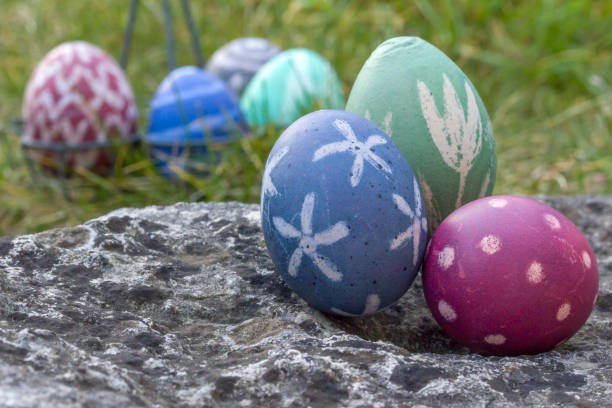 Nest of natural-colored Easter eggs stock photo