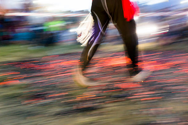 Nestinar walking on fire Nestinarstvo is a fire ritual originally performed in several Bulgarian and Greek  villages. It involves a barefoot dance on smouldering embers performed by nestinari. firewalking stock pictures, royalty-free photos & images