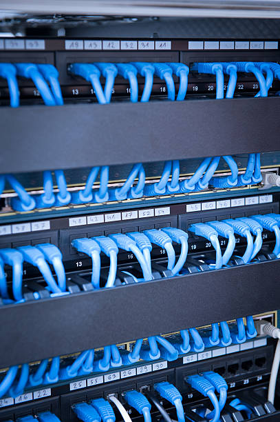 Network hub and cable with blue stock photo