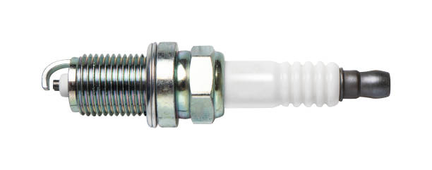 New automobile spark plug isolated on white. Ready for clipping path. New automobile spark plug isolated on white. Ready for clipping path. iridium stock pictures, royalty-free photos & images