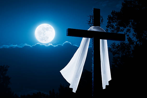 New Easter Morning Christian Cross Concept Jesus Risen at Night  good friday stock pictures, royalty-free photos & images