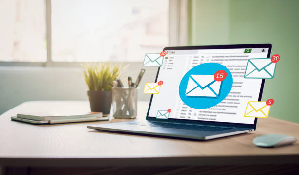 New email alert on laptop, communication connection message to global letters in the workplace. stock photo