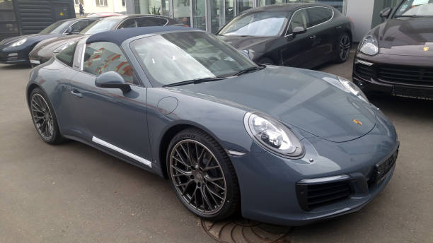 New gray Porsche 911 991 Targa in the parking lot. Convertible with a soft roof. stock photo