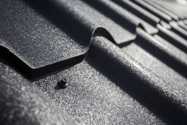 new house roof. details of screw closeup stock photo