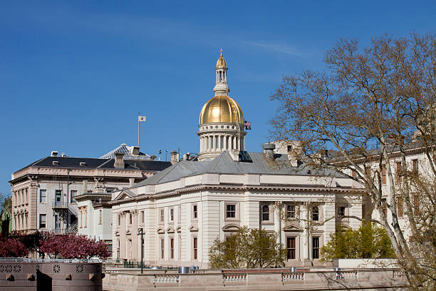 New Jersey State Capitol Building Golden Dome in Trenton Gold dome of the New Jersey State Capitol Building in Trenton on a beautiful spring day. Off center for copy space capital cities stock pictures, royalty-free photos & images