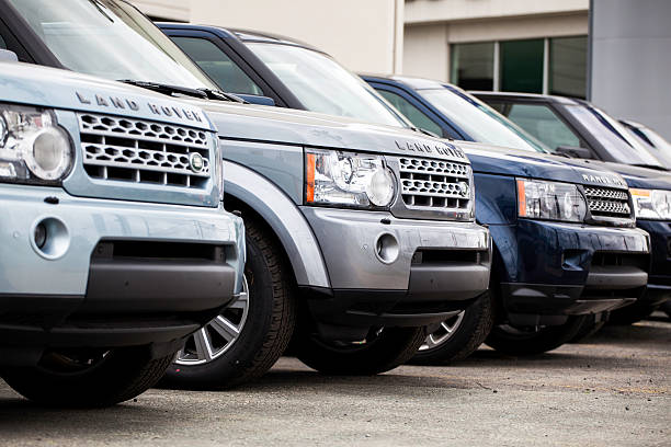 New Land Rover Vehicles in a Row stock photo