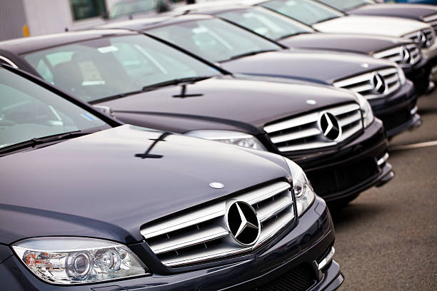 New Mercedes Benz C-Class Vehicles in a Row stock photo