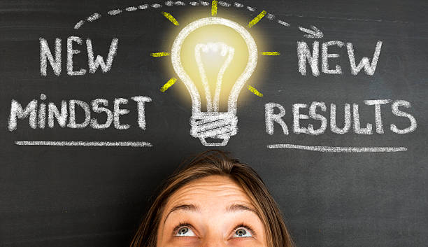New Mindset New Results concept on blackboard moving tips stock pictures, royalty-free photos & images