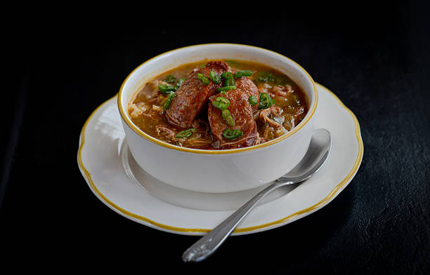 New Orleans style gumbo A delicious food dish from New Orleans with vegetables, spices and Andouille Sausage.  gumbo stock pictures, royalty-free photos & images