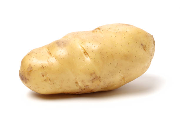 New potato isolated on white background New potato isolated on white background prepared potato stock pictures, royalty-free photos & images