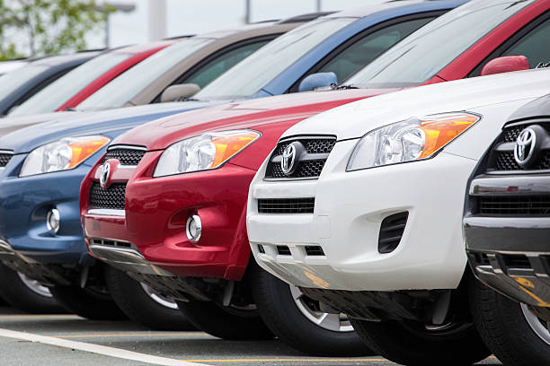 New Toyota Rav4 Vehicles in a Row at Car Dealership stock photo